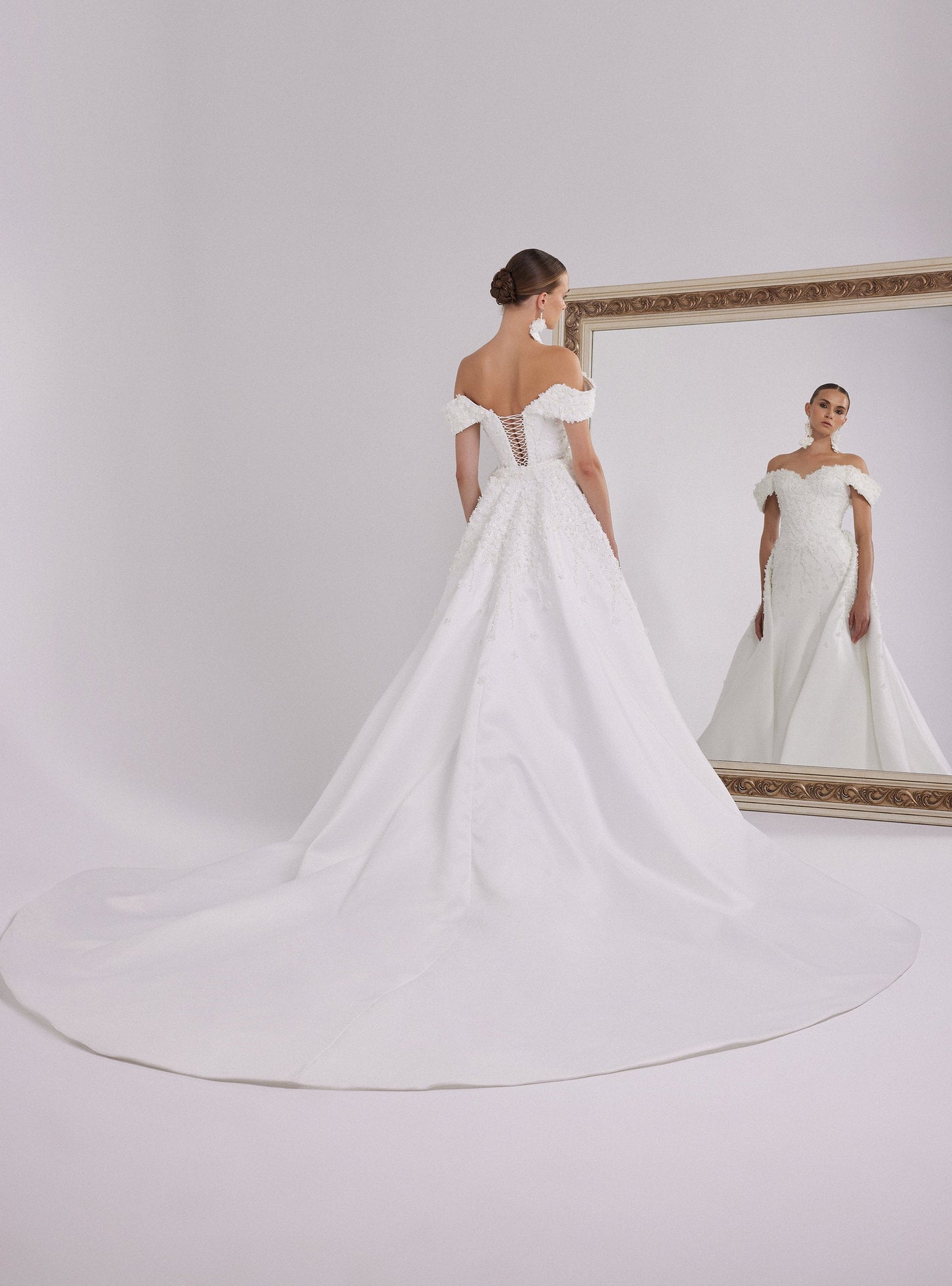 Romantic White Satin Wedding Gown with Off-Shoulder Neckline