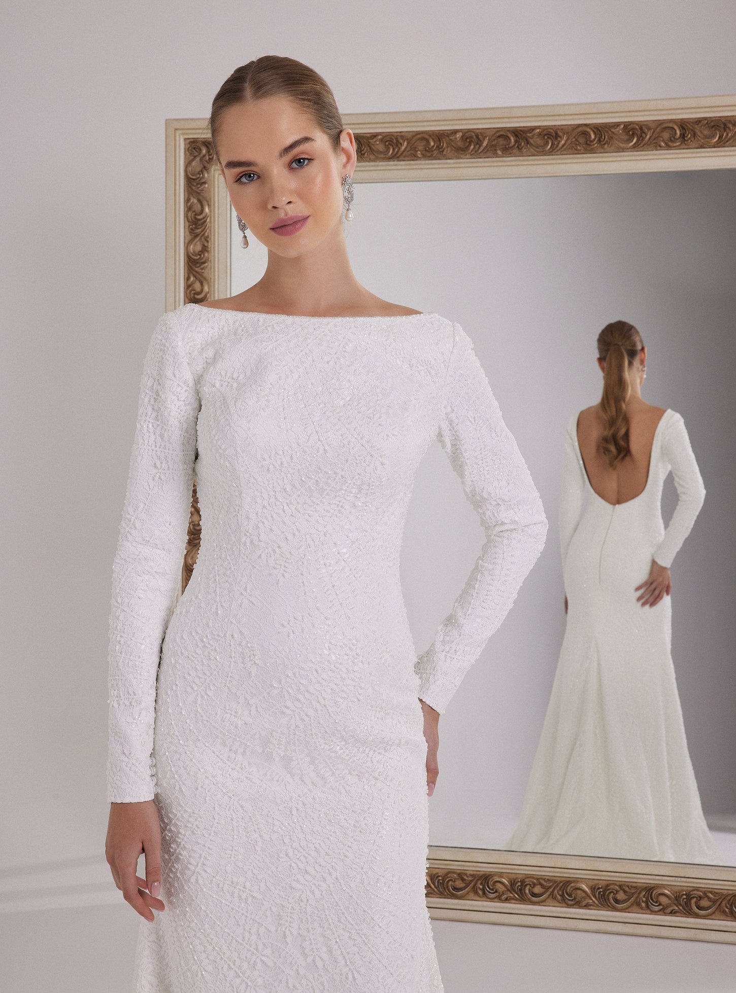 Long Sleeve Mermaid Wedding Dress with a Deep Back Decollete