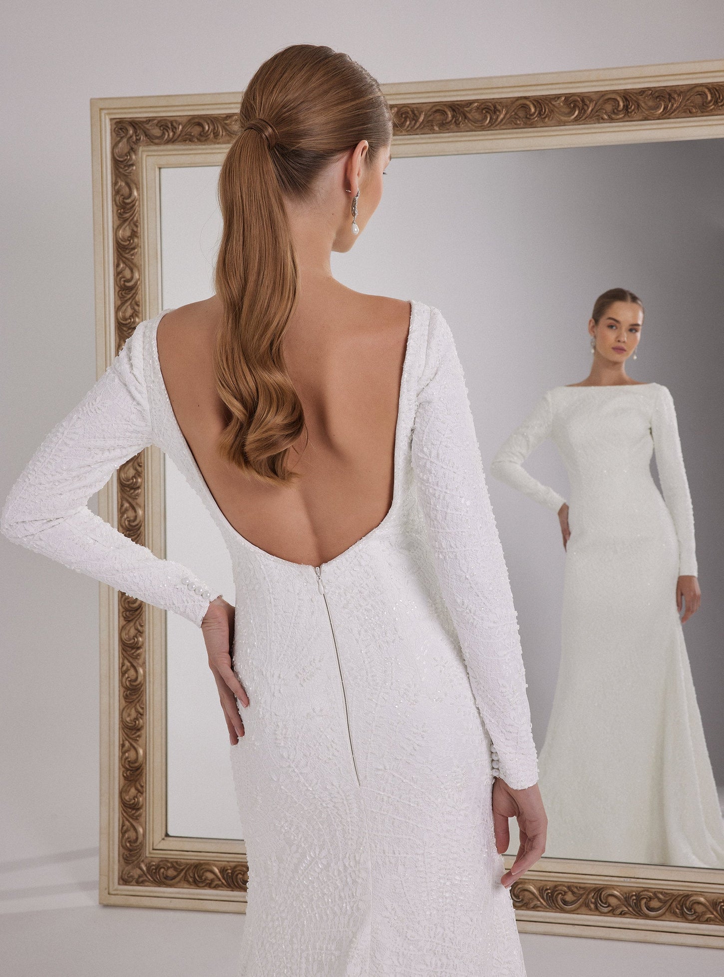Long Sleeve Mermaid Wedding Dress with a Deep Back Decollete