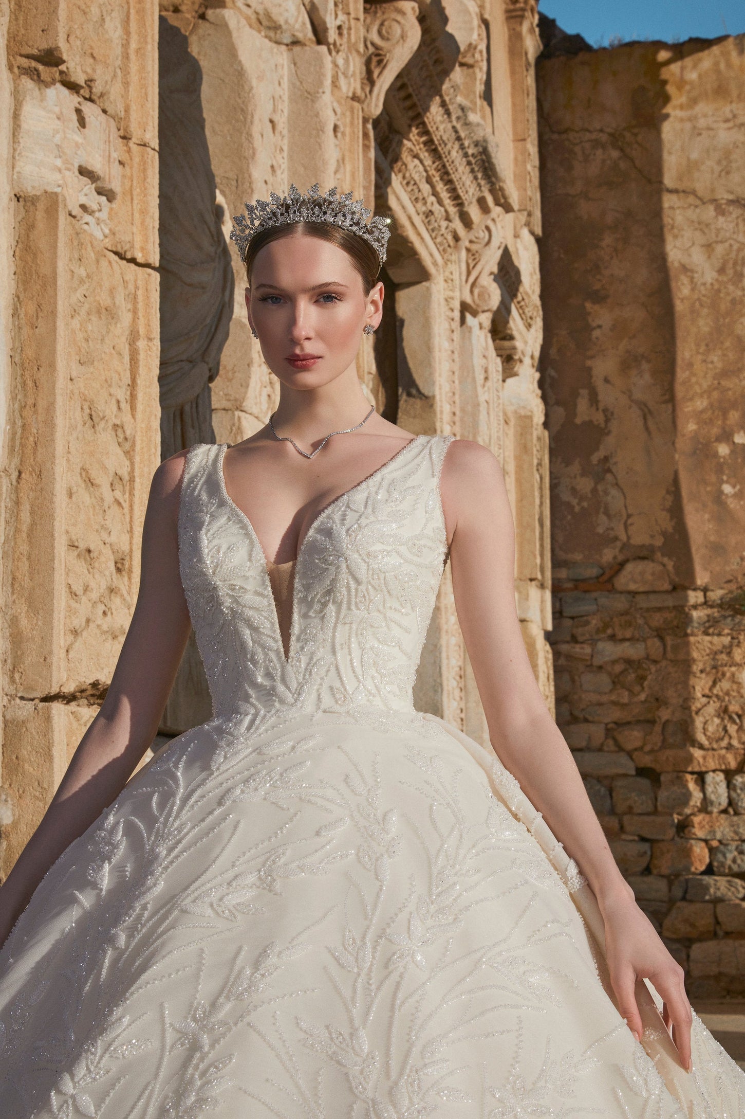 Blossom Beauty: Floral Bridal Dress with Plunging Neckline