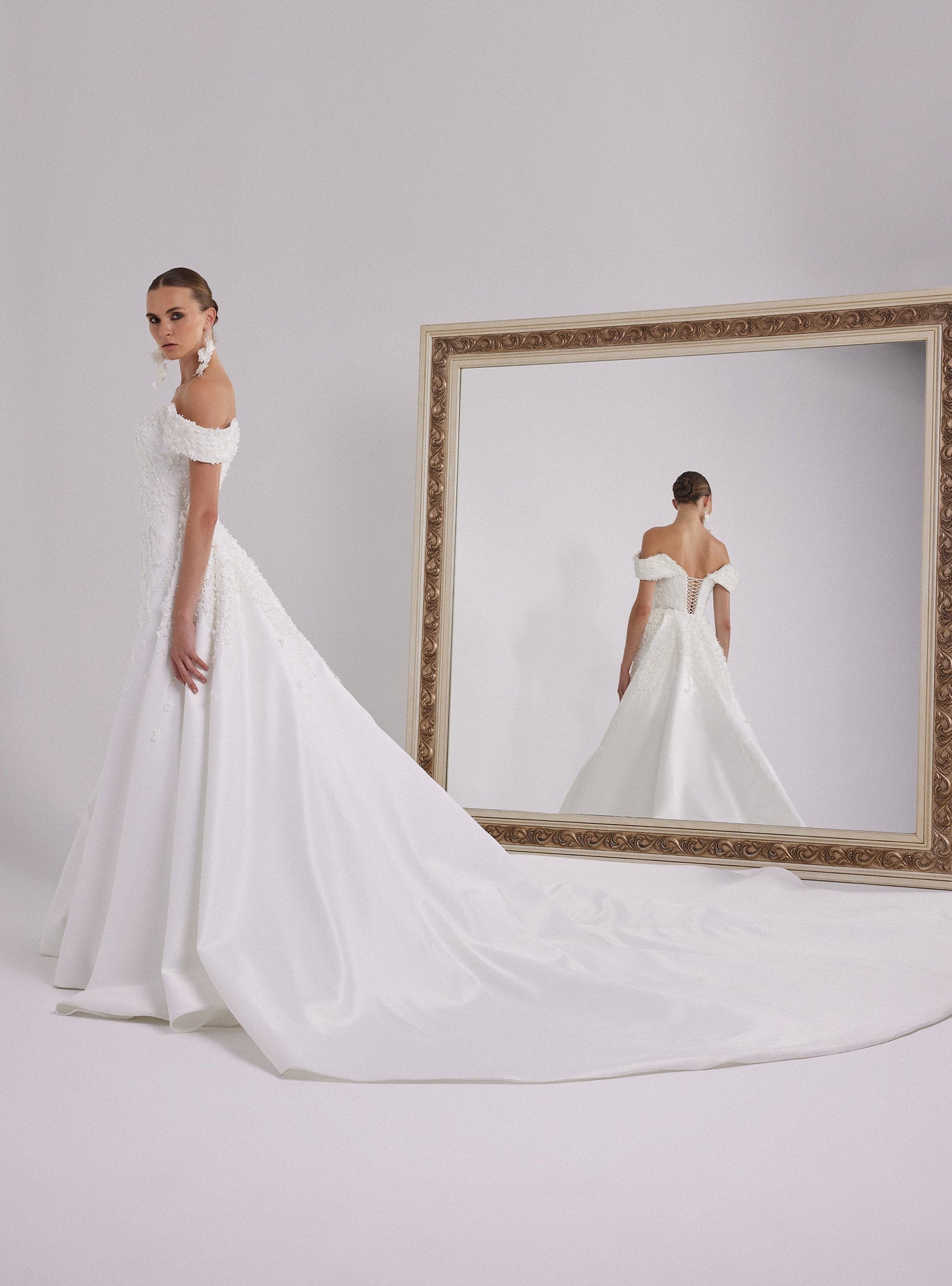 Romantic White Satin Wedding Gown with Off-Shoulder Neckline