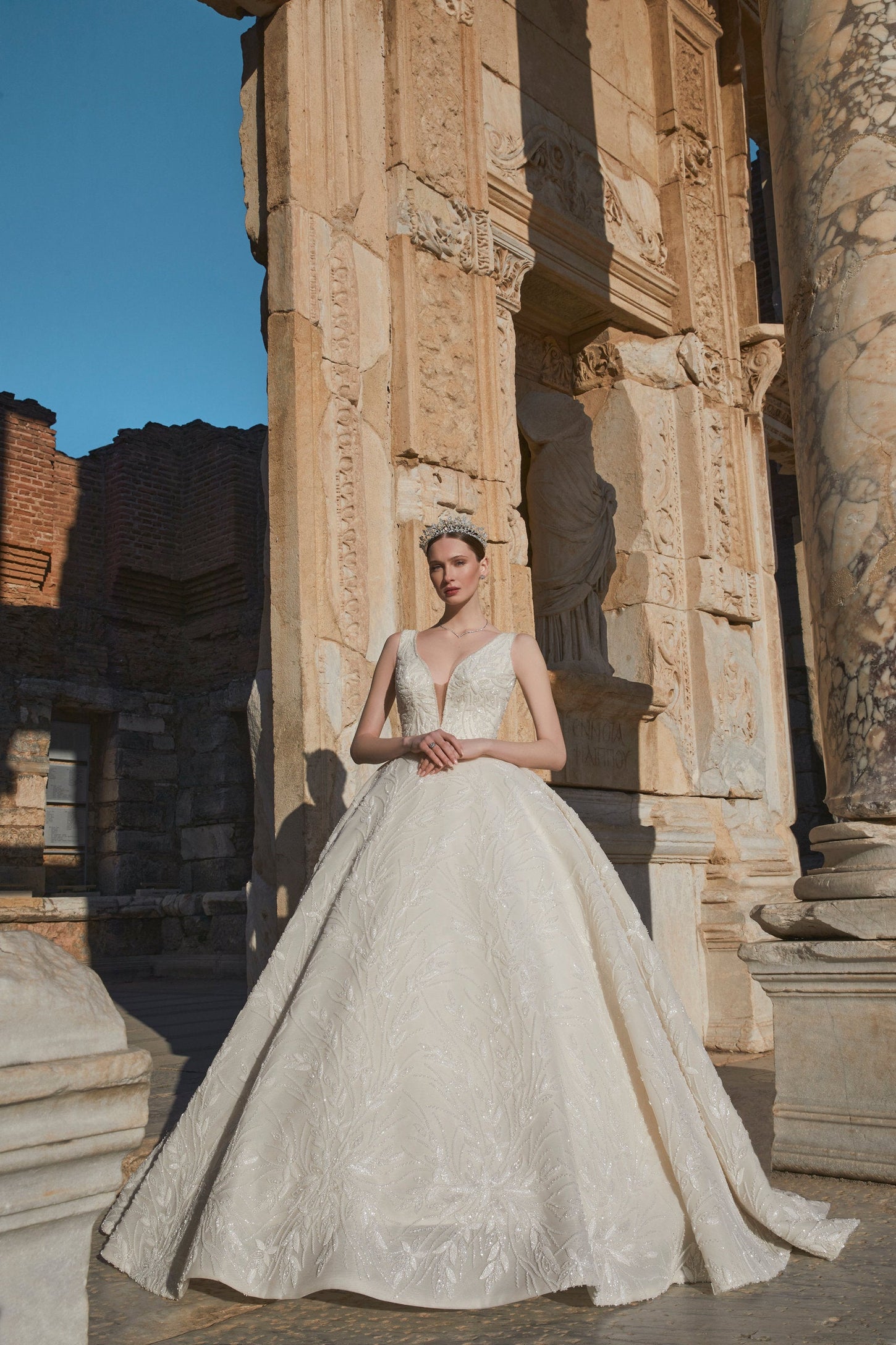 Blossom Beauty: Floral Bridal Dress with Plunging Neckline