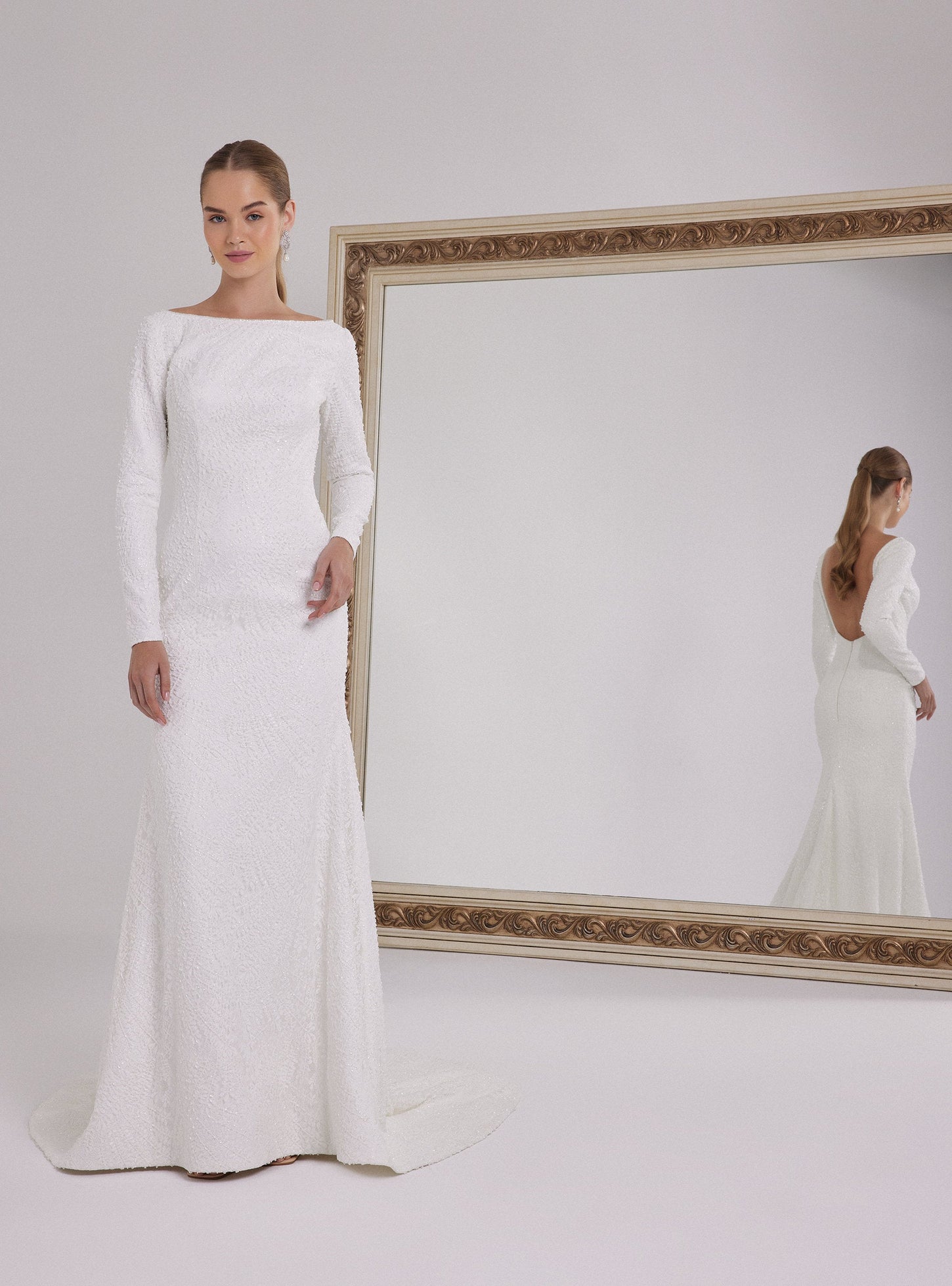 Long Sleeve Mermaid Wedding Dress with a Deep Back Decollete