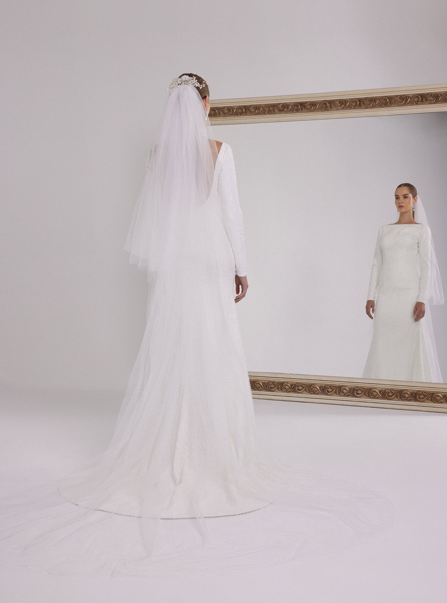 Long Sleeve Mermaid Wedding Dress with a Deep Back Decollete