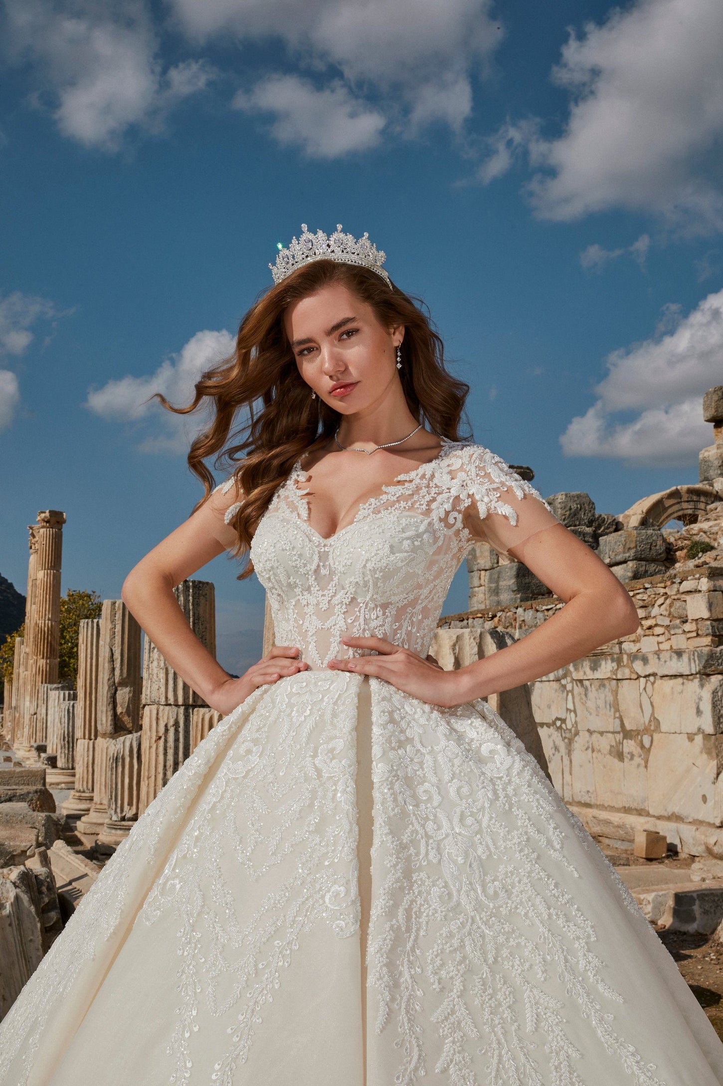 Contemporary Charm: Ivory Ball Gown with Illusion Back