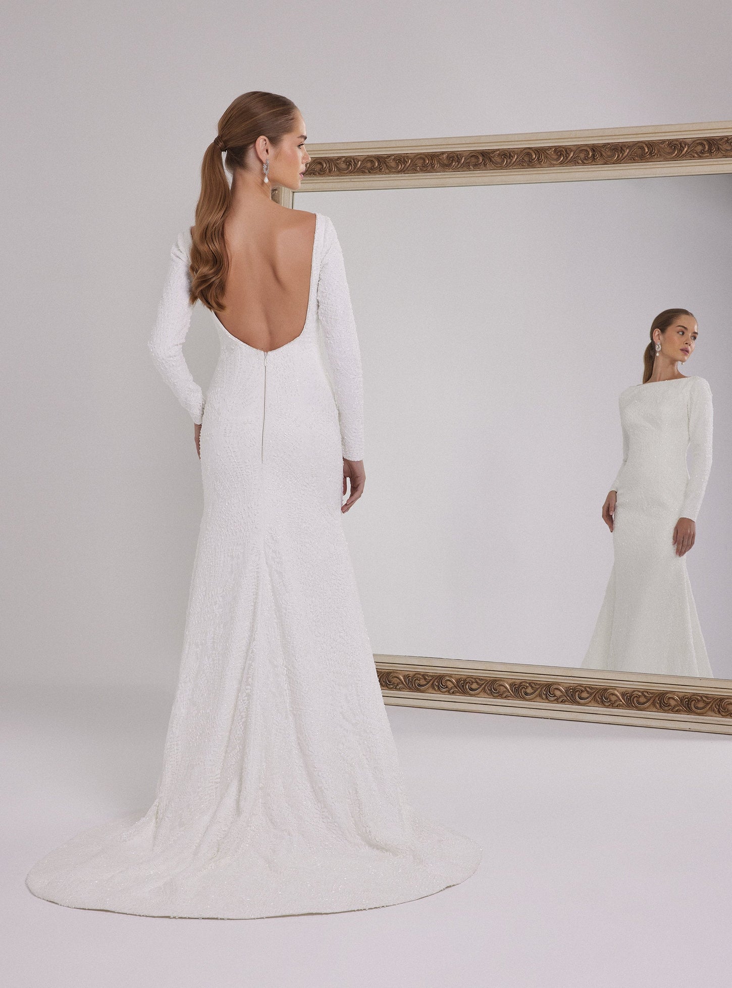 Long Sleeve Mermaid Wedding Dress with a Deep Back Decollete