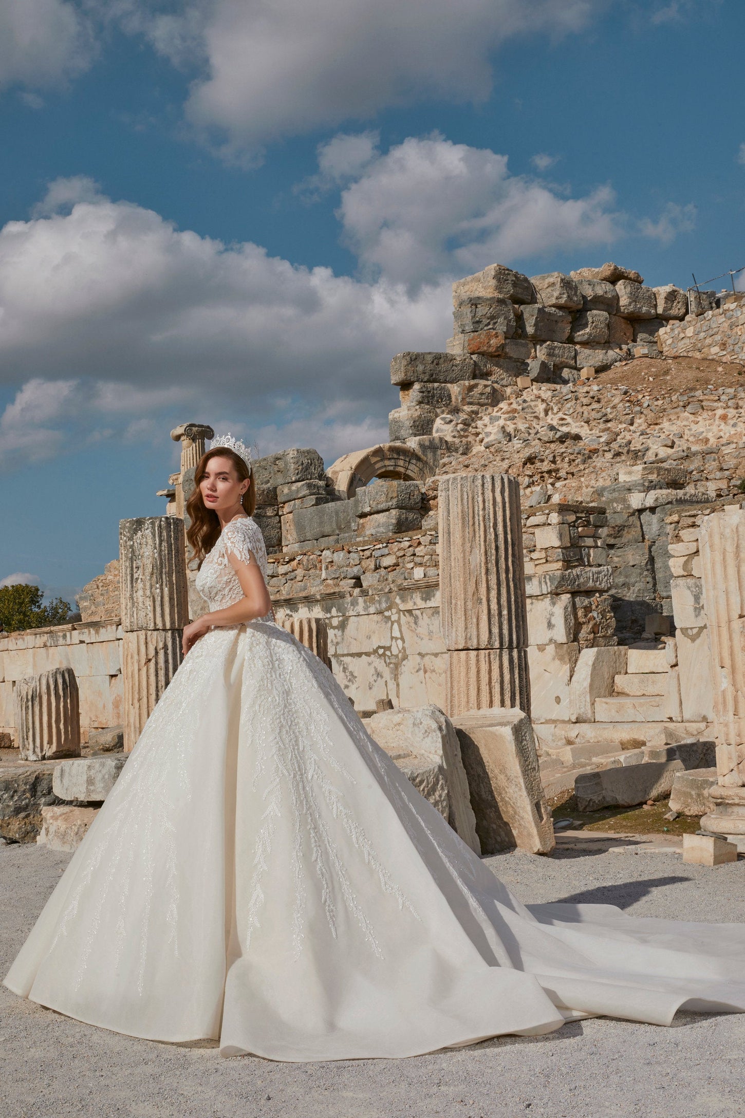 Contemporary Charm: Ivory Ball Gown with Illusion Back