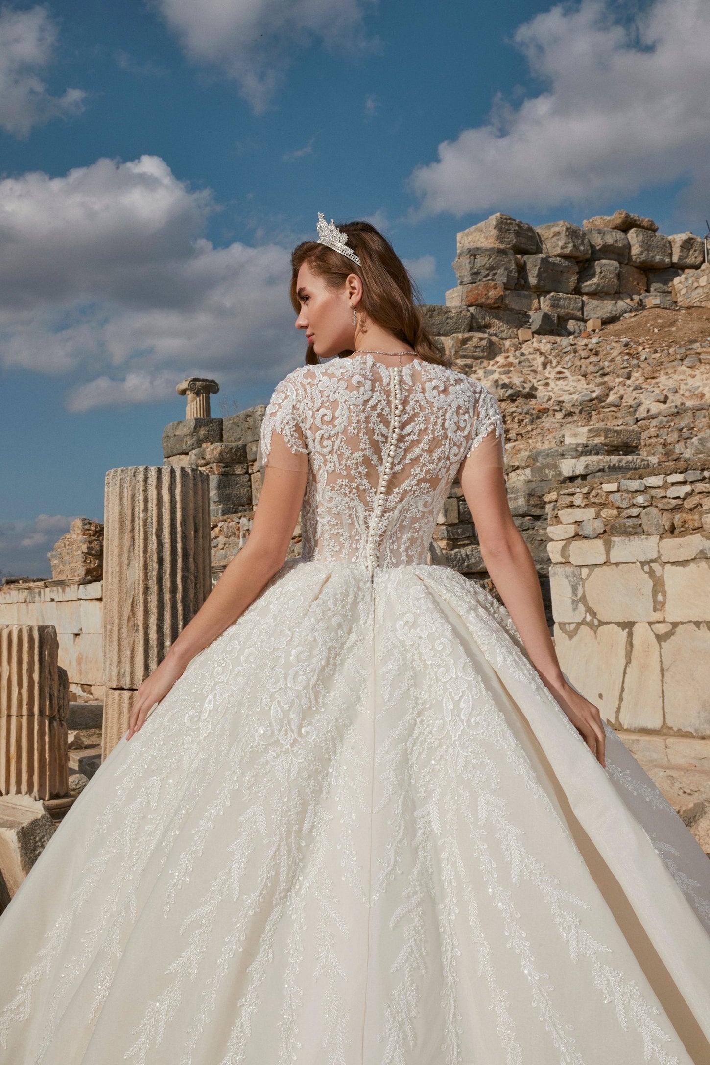 Contemporary Charm: Ivory Ball Gown with Illusion Back